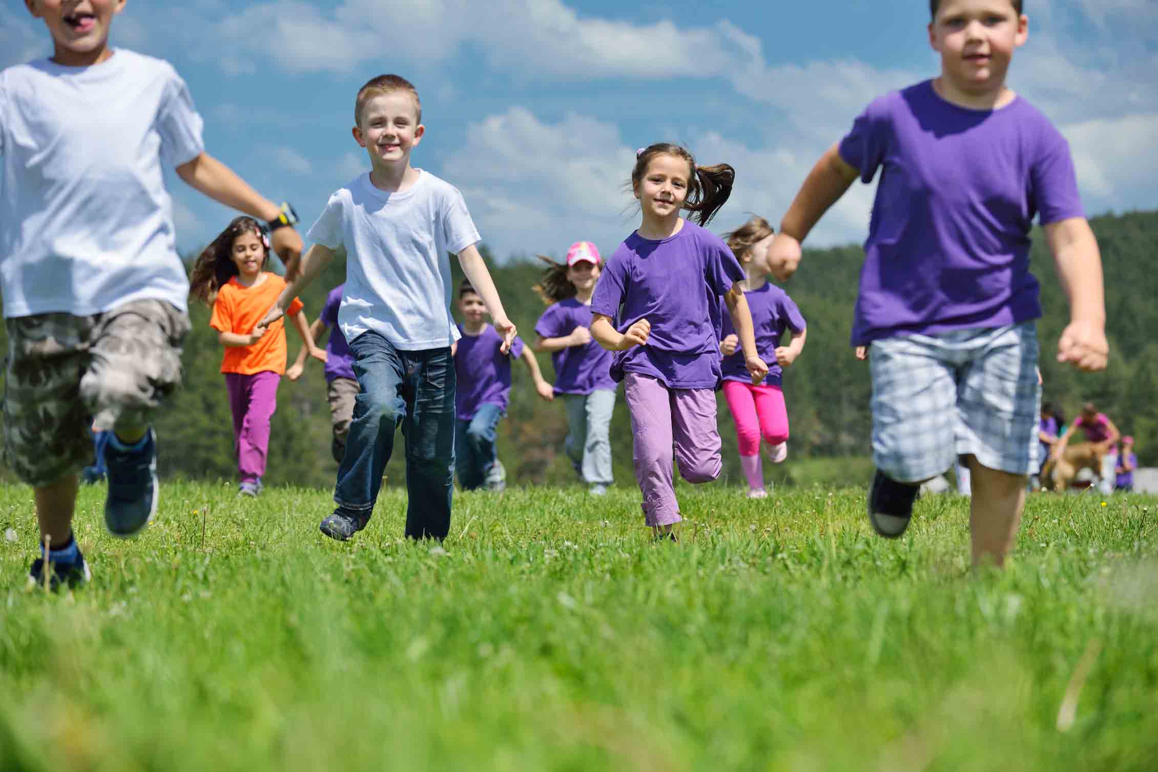 Kids in Grassy Field