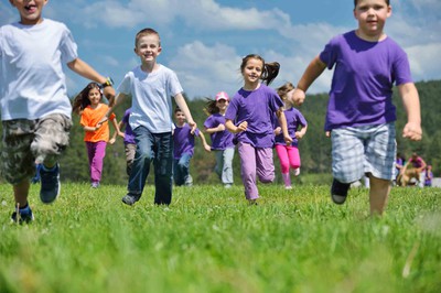 Kids in Grassy Field
