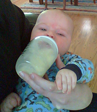 Owen with the bottle Owen's feeding