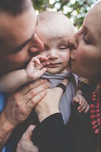 Couple with their baby