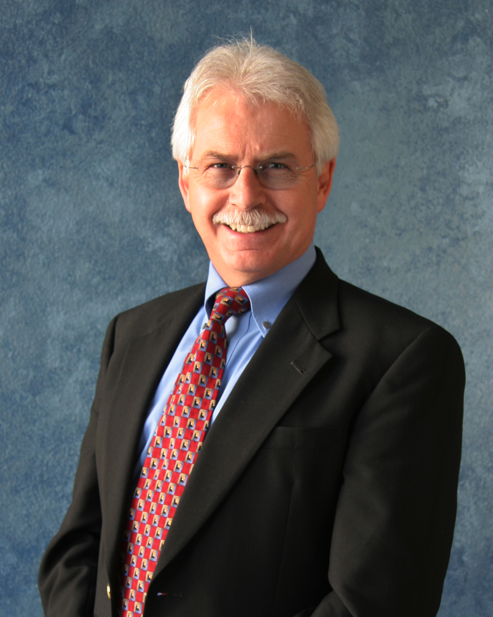 Dr. Gene Sharratt