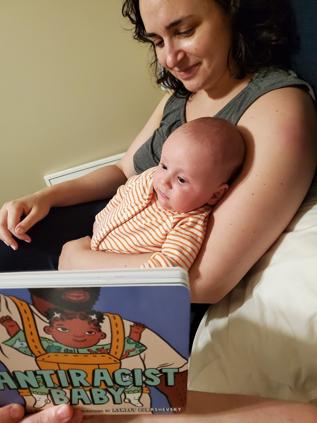 Mom reading to baby