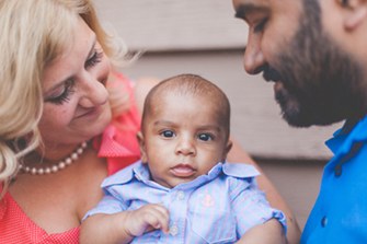 Two parents with their baby
