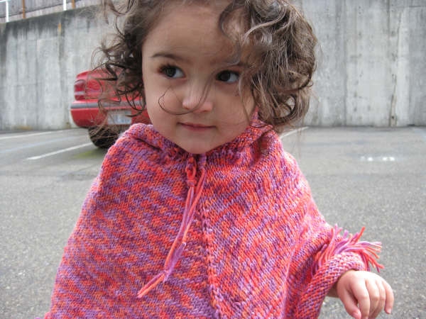 Toddler in Poncho