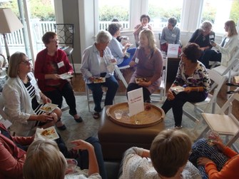 Grandparents gathered at Grandparent Happy Hour during National Grandparents Day